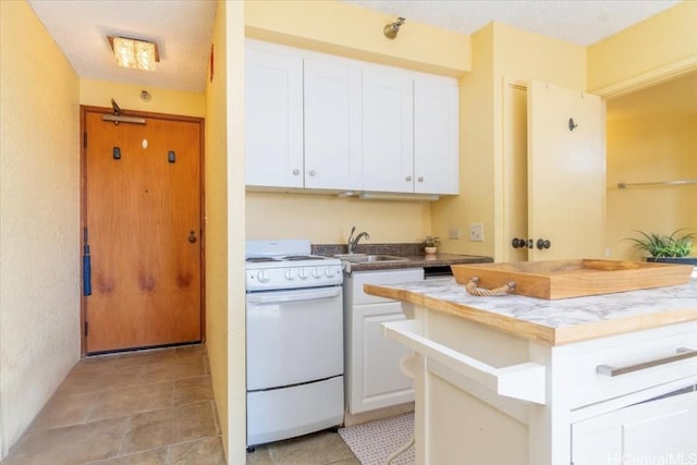 kitchen with sink, white cabinets, white electric range oven, and a textured ceiling