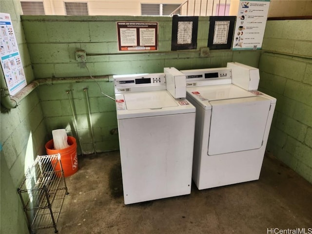 laundry room featuring separate washer and dryer