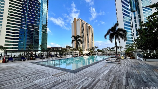 view of swimming pool featuring a patio area