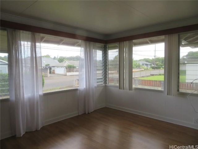 unfurnished sunroom with a wealth of natural light