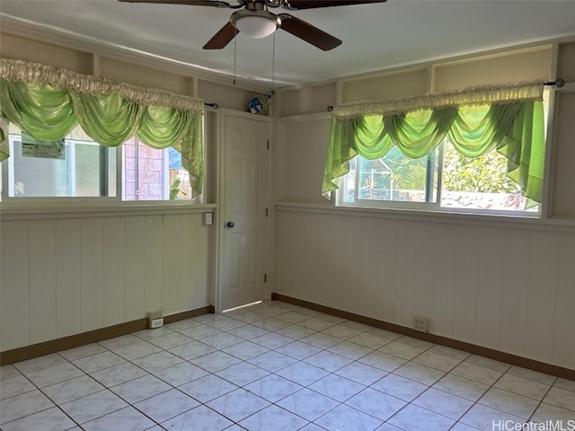 empty room featuring ceiling fan