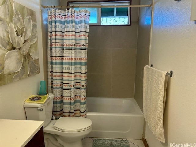 full bathroom with tile patterned floors, vanity, shower / tub combo, and toilet