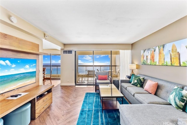 living room featuring light parquet flooring