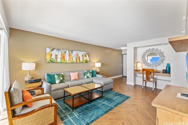 living room featuring parquet floors