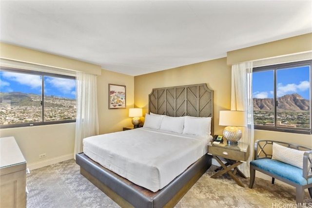 bedroom with a mountain view