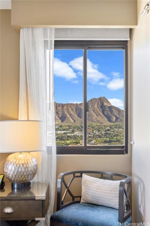 living area featuring a mountain view