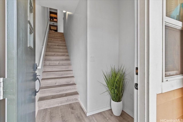 91-1081 Iwikuamoo St Unit 1203, Ewa Beach, HI 96706 - staircase with wood finished floors and baseboards