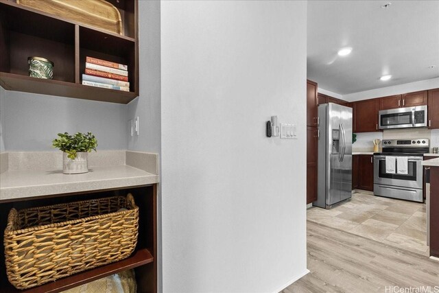 91-1081 Iwikuamoo St Unit 1203, Ewa Beach, HI 96706 - kitchen featuring appliances with stainless steel finishes, light countertops, light wood finished floors, and recessed lighting