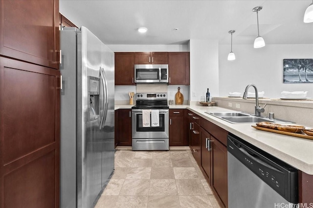 91-1081 Iwikuamoo St Unit 1203, Ewa Beach, HI 96706 - kitchen with stainless steel appliances, light countertops, and pendant lighting