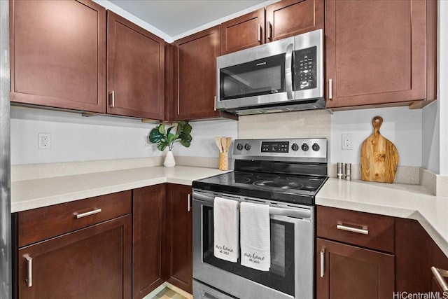 91-1081 Iwikuamoo St Unit 1203, Ewa Beach, HI 96706 - kitchen with appliances with stainless steel finishes and light countertops