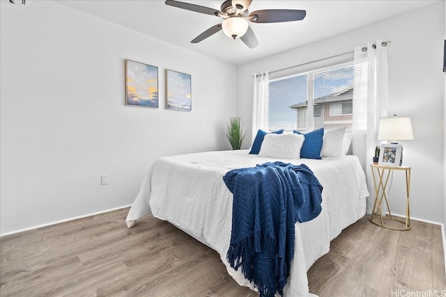 91-1081 Iwikuamoo St Unit 1203, Ewa Beach, HI 96706 - bedroom featuring wood finished floors and a ceiling fan