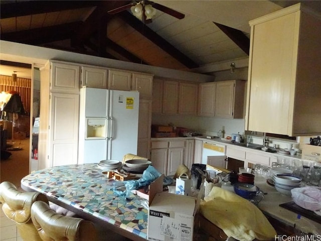 kitchen featuring vaulted ceiling with beams, ceiling fan, sink, and white refrigerator with ice dispenser