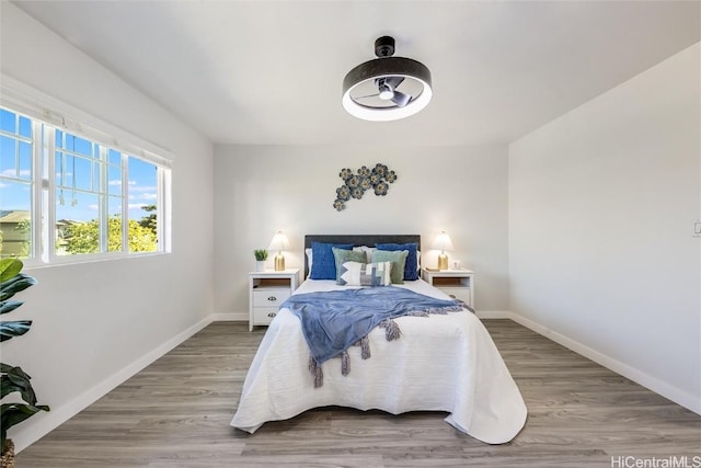 bedroom featuring hardwood / wood-style flooring