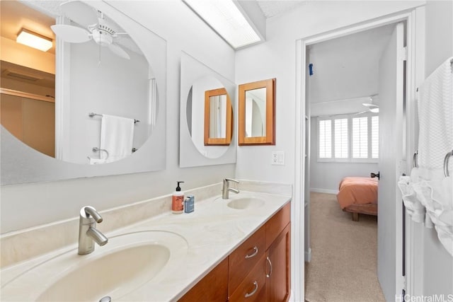 bathroom with vanity and ceiling fan