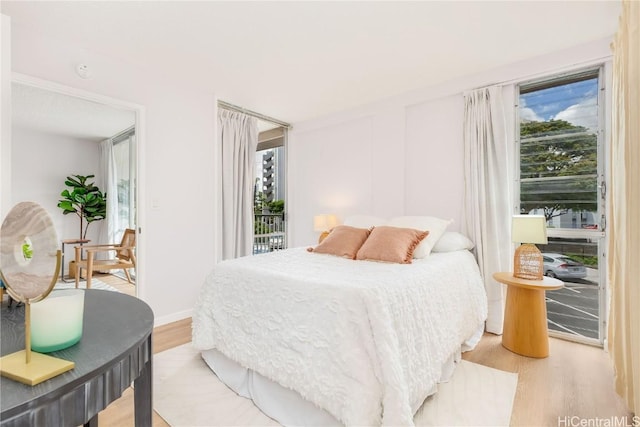 bedroom with light wood-type flooring