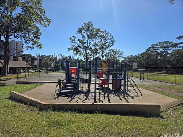 view of playground featuring a lawn