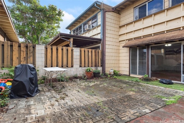 view of patio featuring a grill