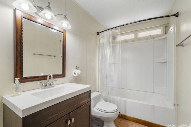 full bathroom featuring toilet, vanity, tile patterned flooring, and shower / bath combo with shower curtain