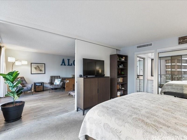 bedroom with a textured ceiling