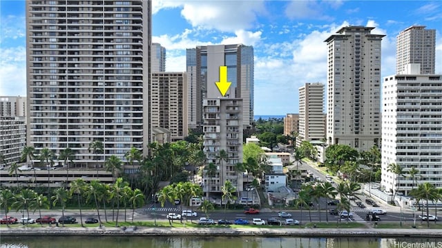 property's view of city with a water view