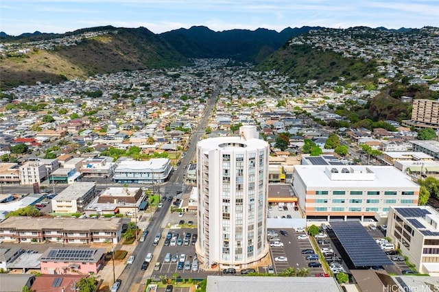 birds eye view of property with a mountain view