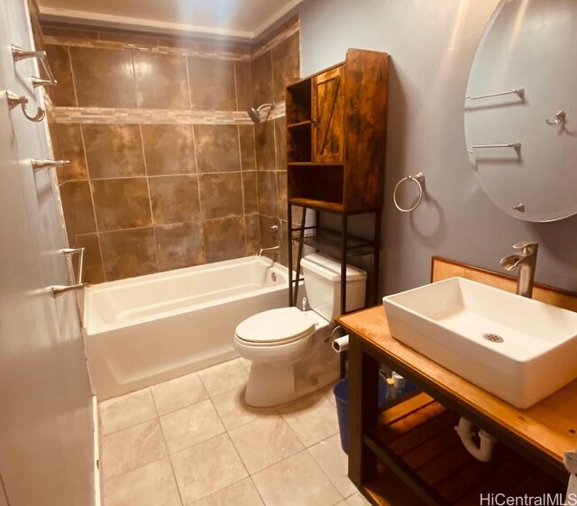 full bathroom with bathtub / shower combination, a sink, toilet, and tile patterned floors