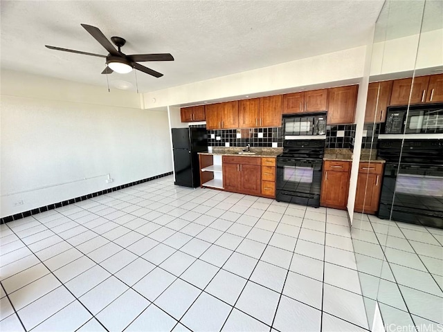 kitchen featuring light tile patterned floors, ceiling fan, black appliances, and tasteful backsplash