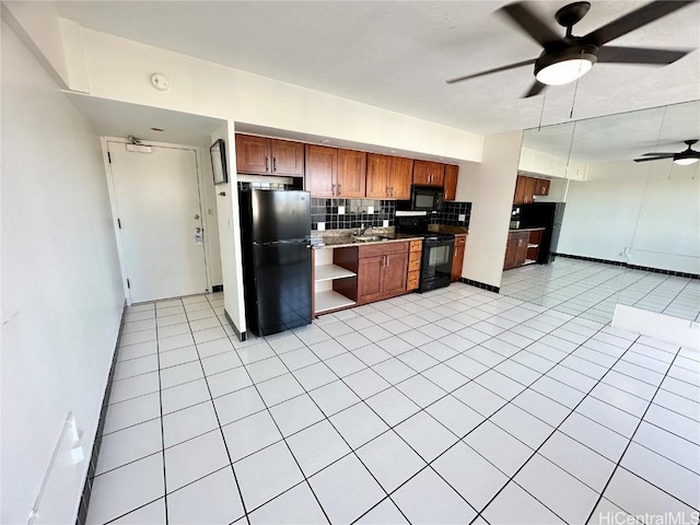 kitchen with black appliances, ceiling fan, decorative backsplash, and light tile patterned floors