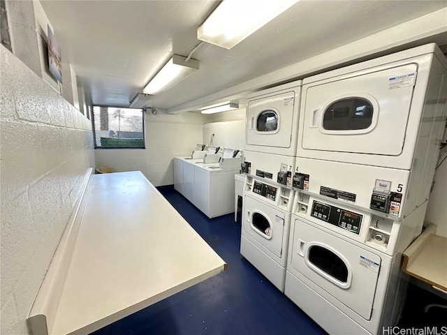 laundry area with separate washer and dryer and stacked washer / dryer