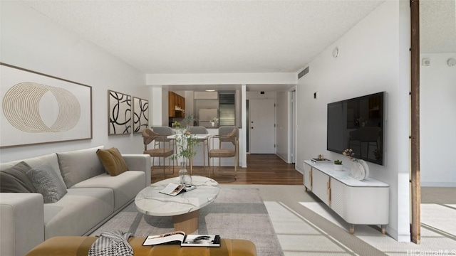 living room with light hardwood / wood-style flooring