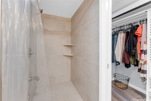 bathroom featuring walk in shower