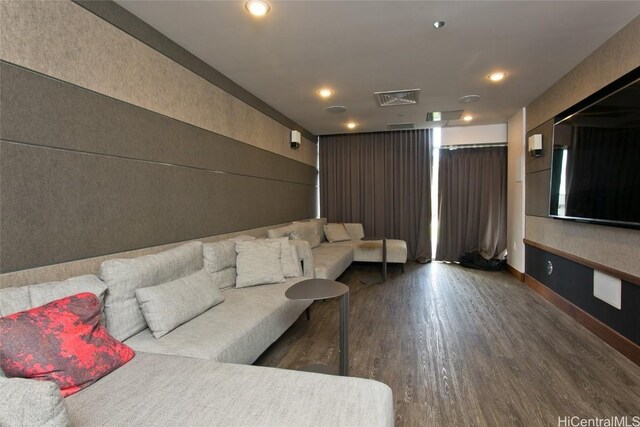 unfurnished living room with dark hardwood / wood-style flooring