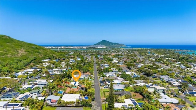 drone / aerial view featuring a mountain view and a residential view