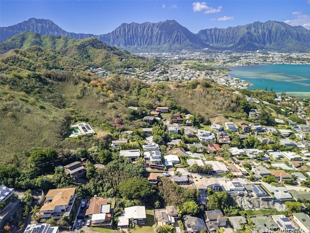 bird's eye view featuring a water and mountain view