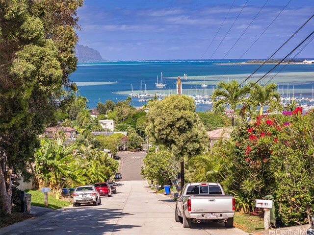 birds eye view of property with a water view