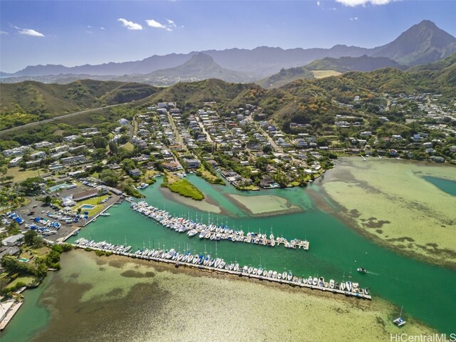 bird's eye view with a water and mountain view