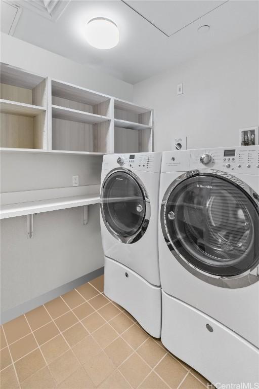 clothes washing area with independent washer and dryer