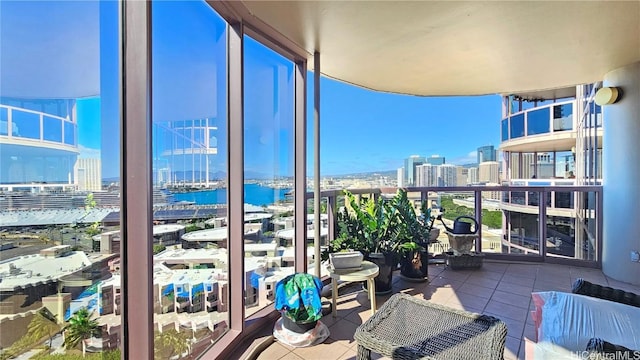 balcony featuring a water view