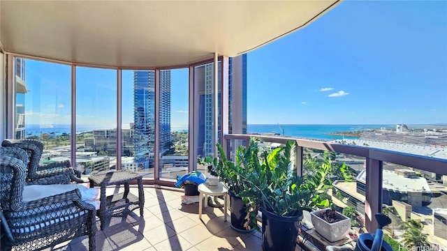 balcony featuring a water view