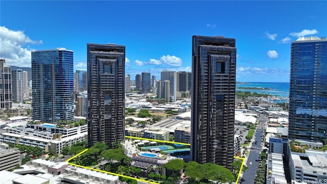 property's view of city with a water view