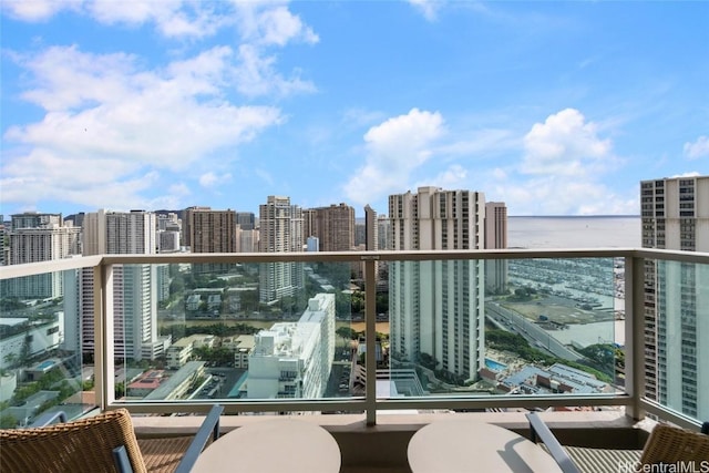 balcony featuring a city view