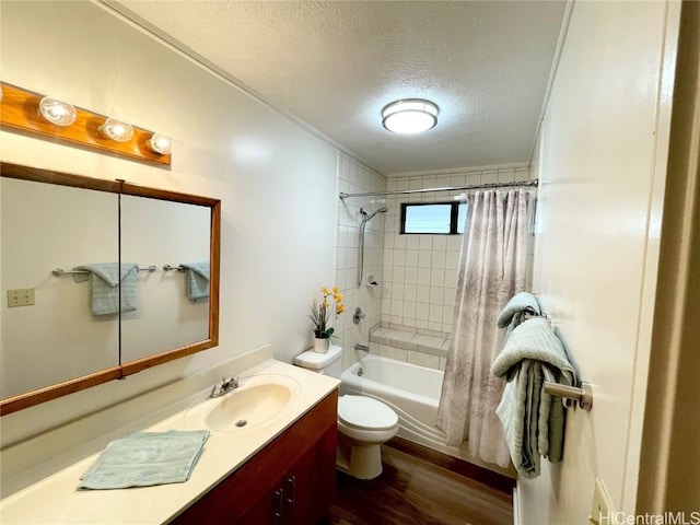 full bathroom featuring shower / bathtub combination with curtain, vanity, wood-type flooring, a textured ceiling, and toilet