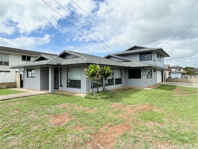 view of front of house featuring a front yard