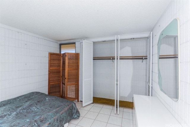 unfurnished bedroom with a textured ceiling