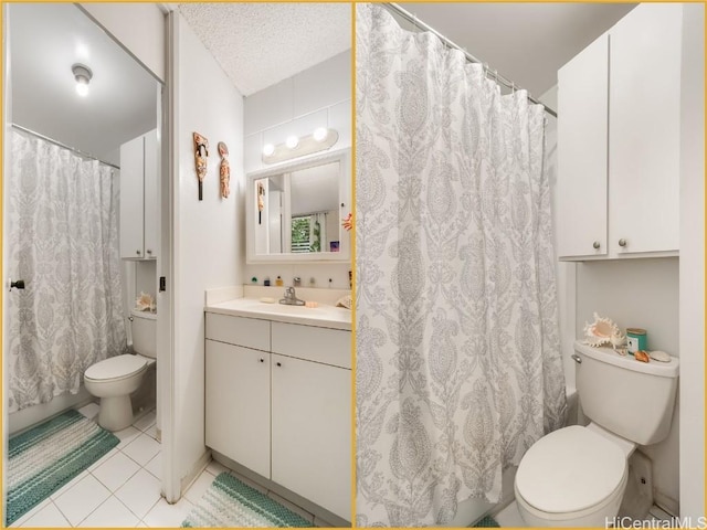 bathroom featuring tile patterned flooring, vanity, toilet, and a textured ceiling