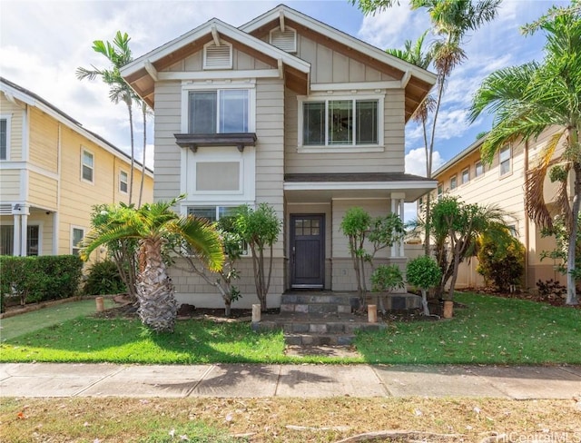 view of front of home with a front lawn