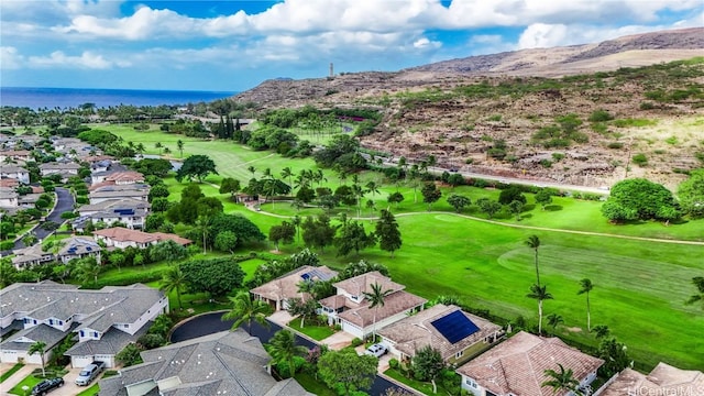 drone / aerial view with a water and mountain view