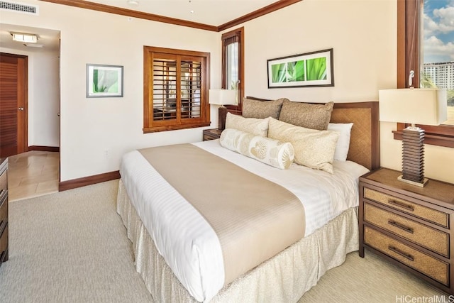 bedroom with ornamental molding