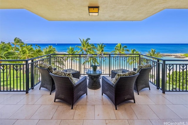 balcony featuring a water view