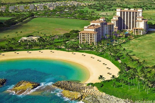 aerial view featuring a water view and a view of the beach